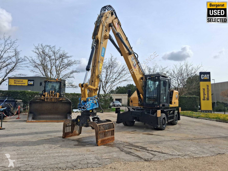 Pelle Caterpillar MH3024