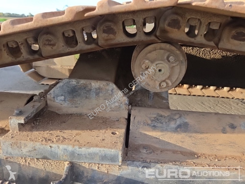 Багер Caterpillar 215C