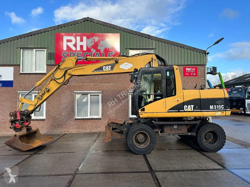 Excavator Caterpillar C WITH ROTOTILT, CE