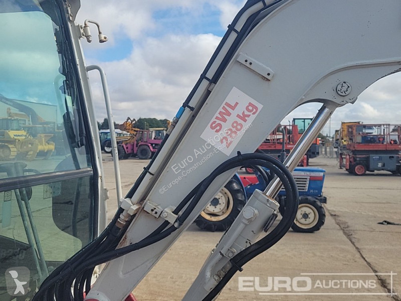 Escavadora Takeuchi 0