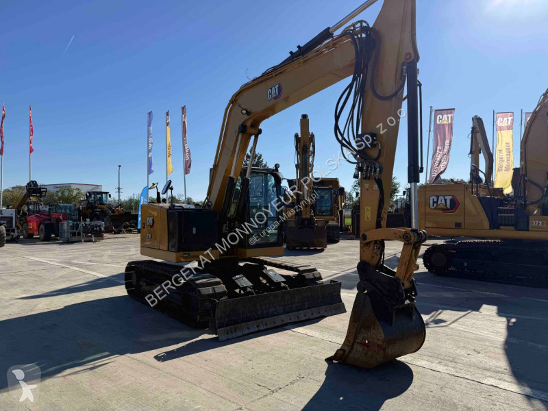 Экскаватор Caterpillar 310