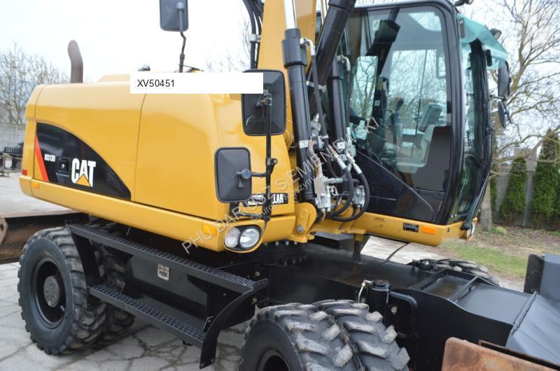 Lopatový nakládač Caterpillar 313