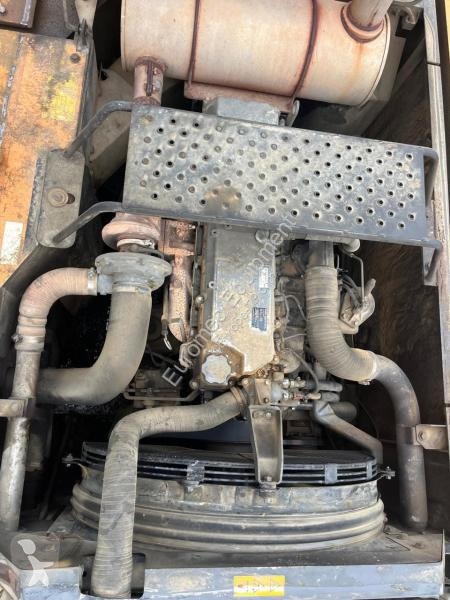 Escavadora Case