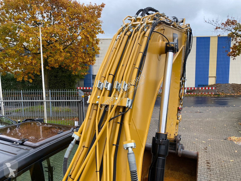Graafmachine Caterpillar NG .