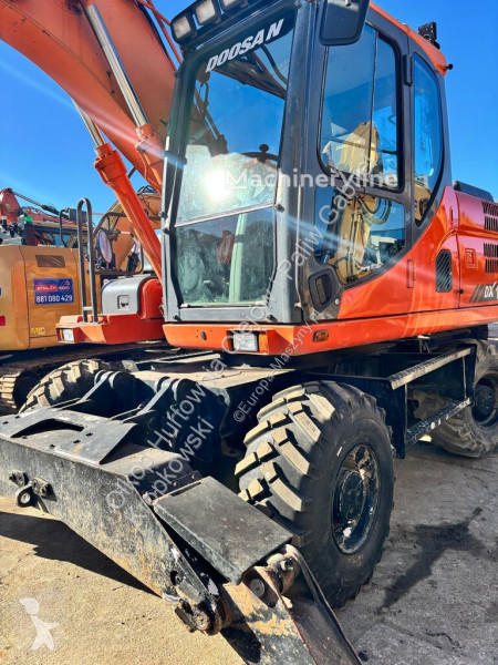 Lopatový nakládač Doosan DX140 W-3 Z SYSTEMEM...