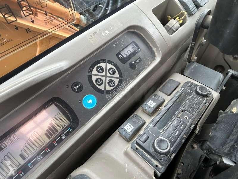 Escavadora Case