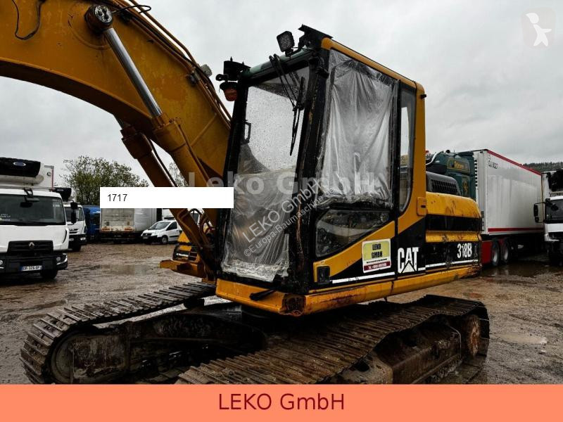 Escavatore Caterpillar 318B Mit Zwei Löffeln