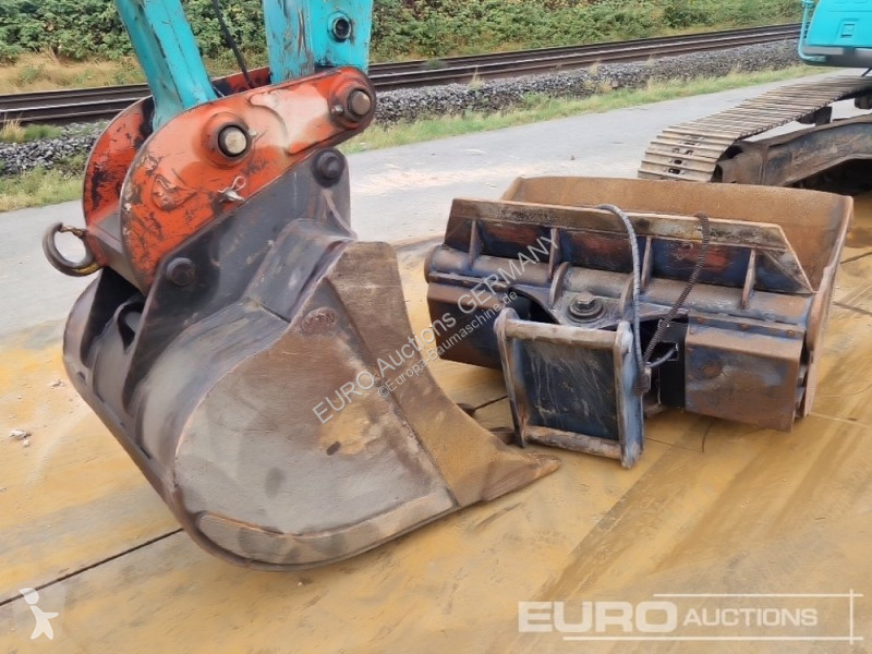 Lopatový nakládač Kobelco SK210-VI