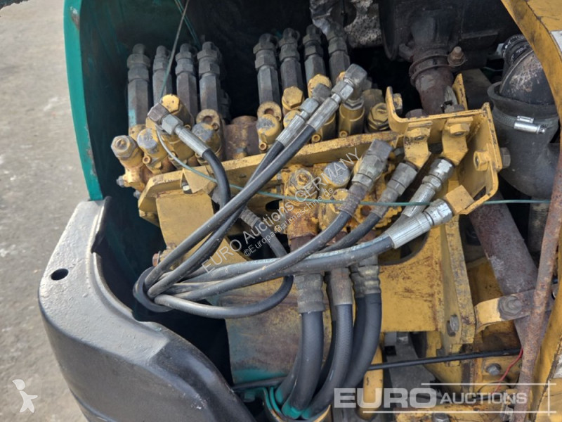 Багер Komatsu PC25-1