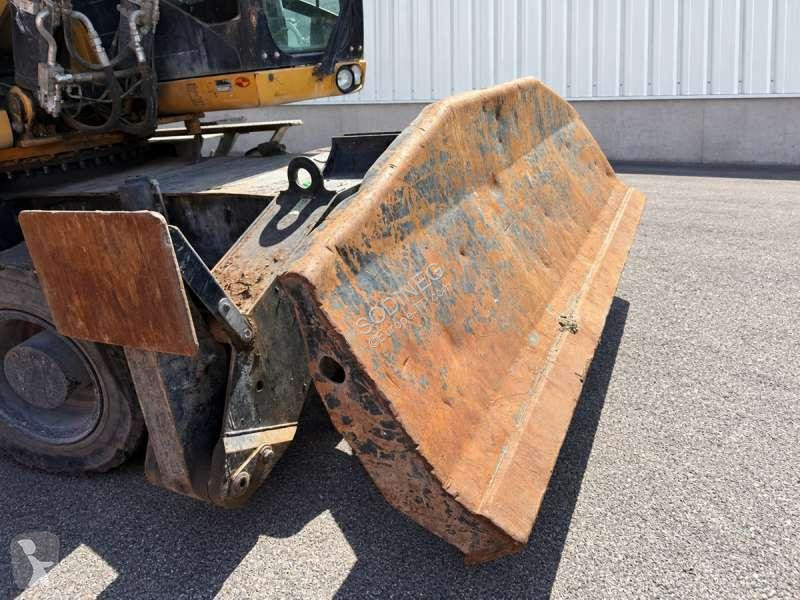 Багер Caterpillar MH