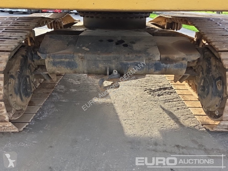 Багер Caterpillar 215C