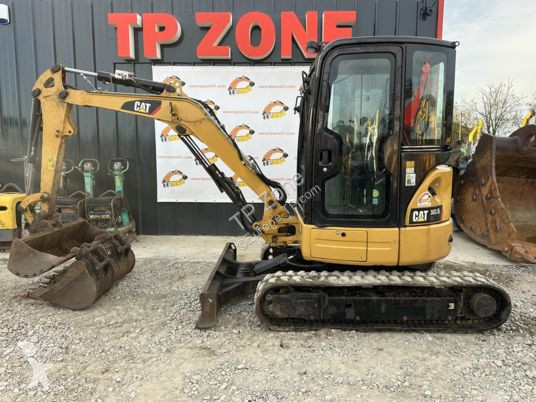 Lopatový nakládač Caterpillar 303.5ecr à 28500...