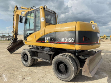 Excavadora de ruedas Caterpillar