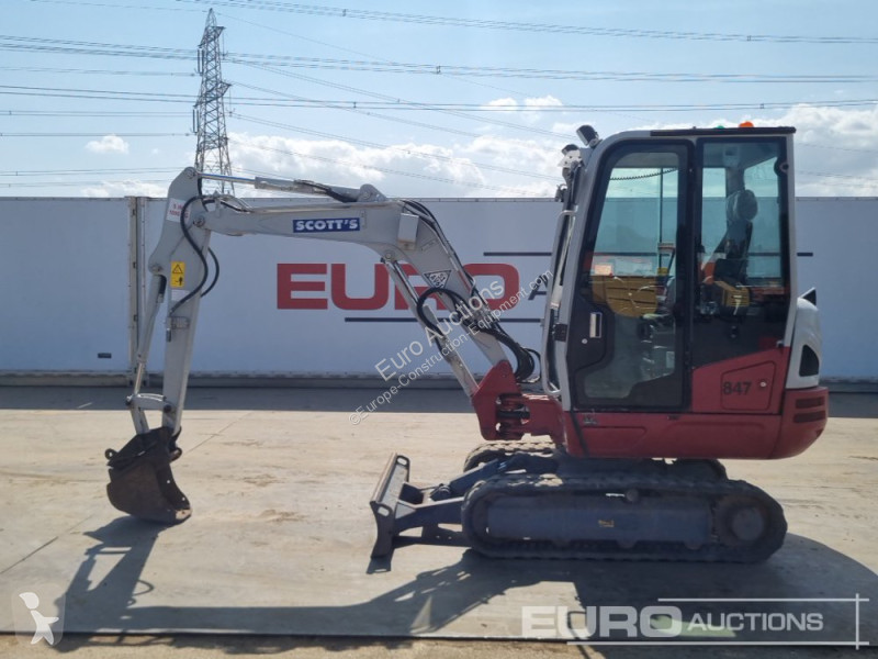 Escavadora Takeuchi 0