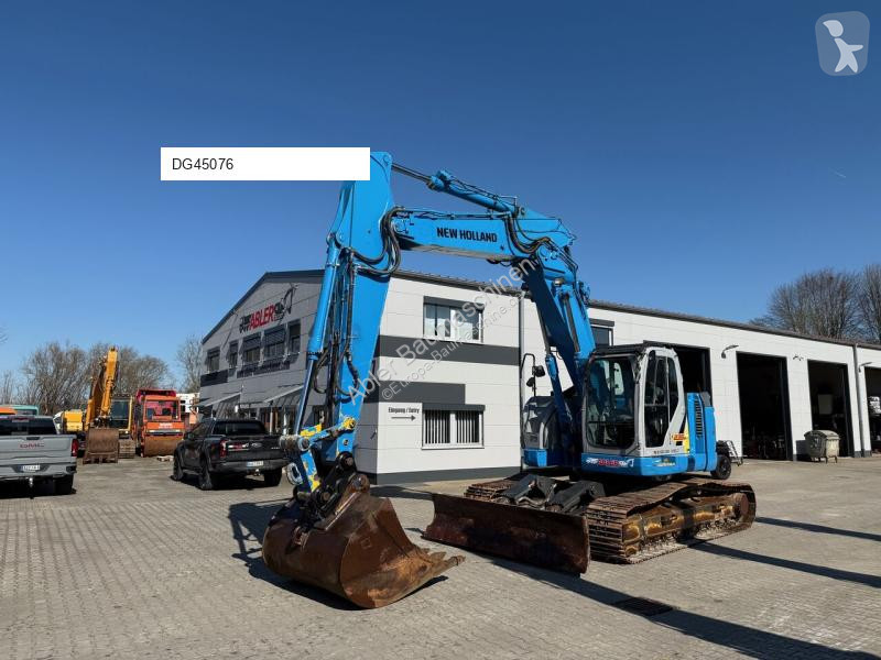 Excavator New Holland Kobelco E235 BSR-2...
