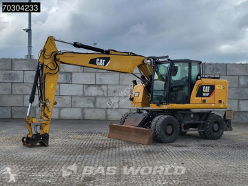 Caterpillar M316 F F Outrigger + Blade