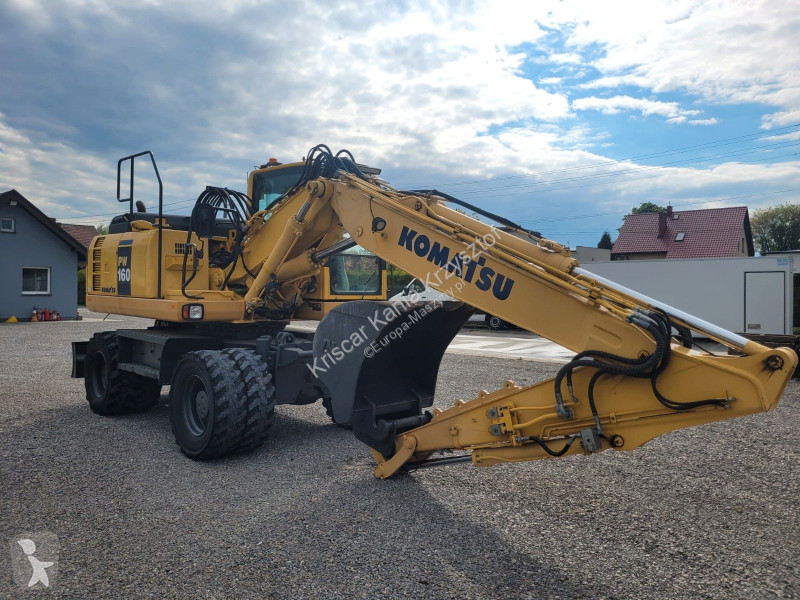 Lopatový nakládač Komatsu - 8 A/C 3 ARMS