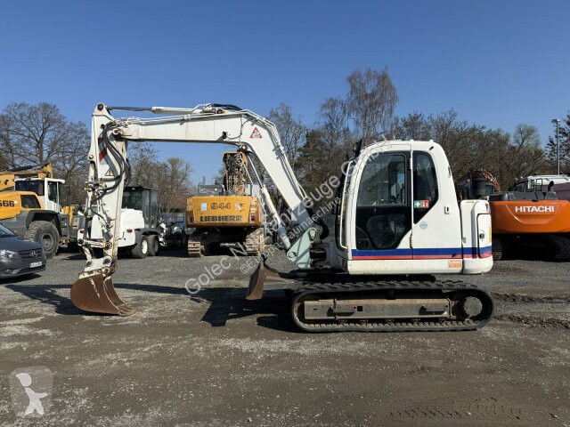 جرافة New Holland E80 BMSR-2 Kettenbagger 8,6...