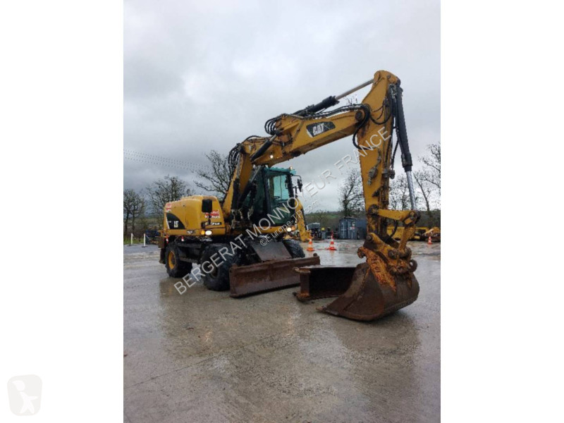 جرافة Caterpillar M313D