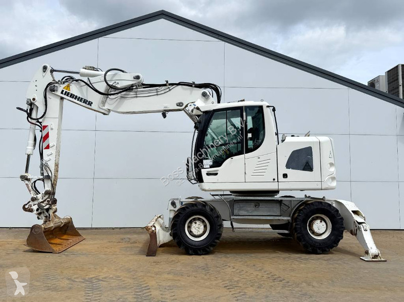 轮胎式挖掘机二手利勃海尔A918 Compact - 5 Buckets + Forks / Quick