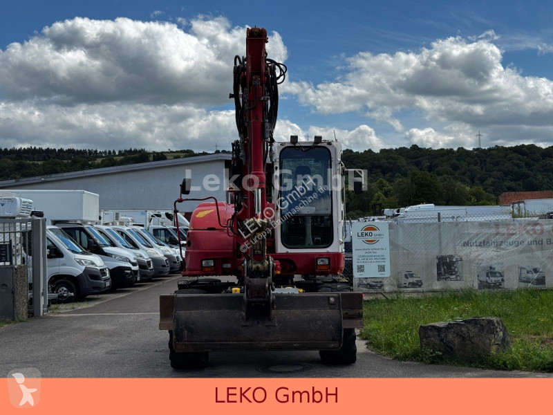 Rýpadlo Komatsu PW118MR-8 Mit Drei Löffeln