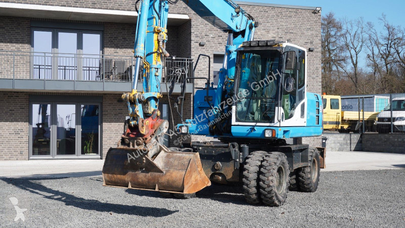 جرافة Komatsu Mobilbagger Verstellausleger HS21