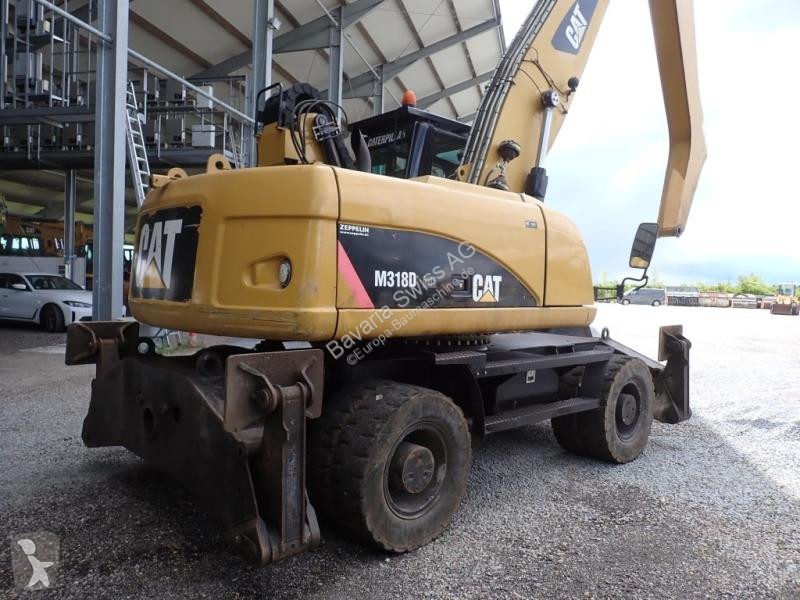 Lopatový nakládač Caterpillar  M318D MH