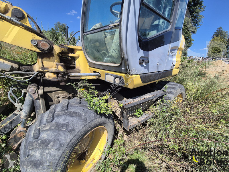 Rýpadlo New Holland 36