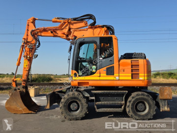 Pelle sur pneus Komatsu