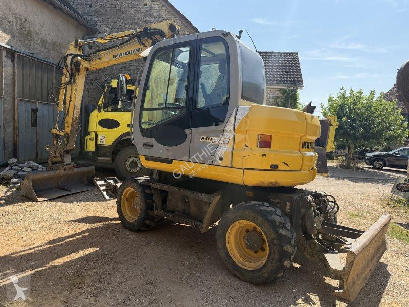 Lopatový nakládač New Holland 26