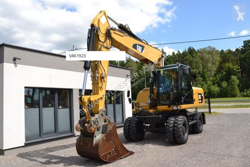 Lopatový nakládač Caterpillar 318 D