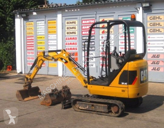 Экскаватор Caterpillar 3014