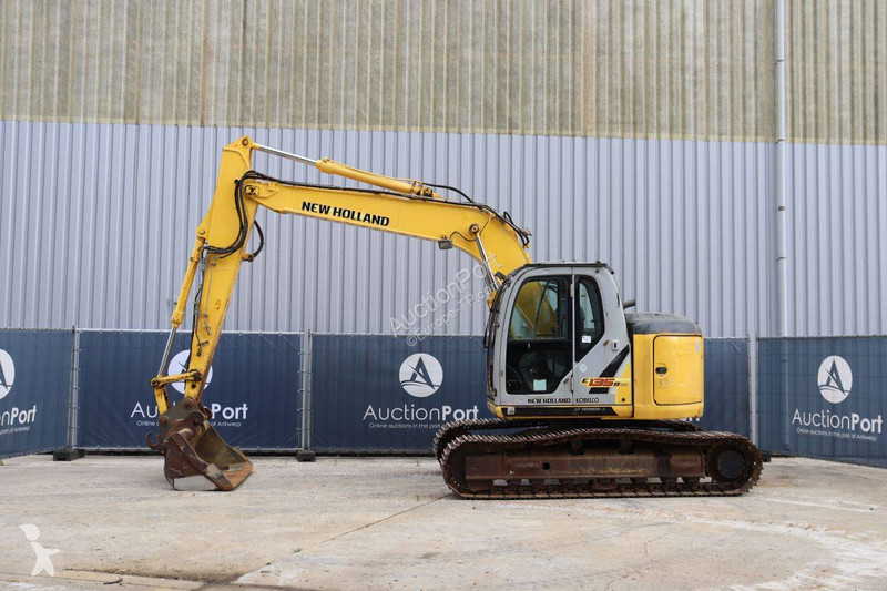 Багер New Holland Kobelco 2