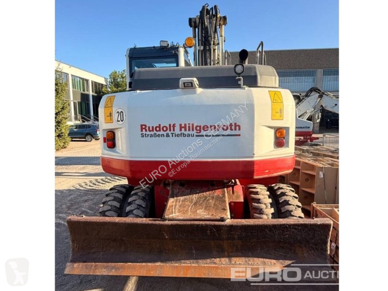 Багер Komatsu PW148-8