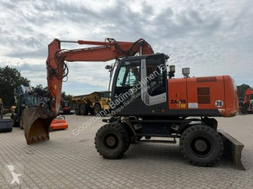 Graafmachine op banden Hitachi