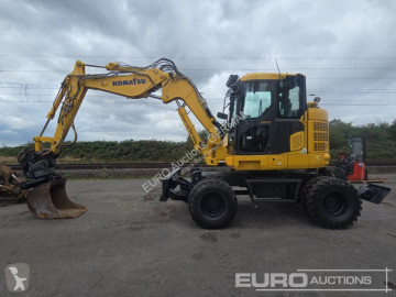 Graafmachine op banden Komatsu