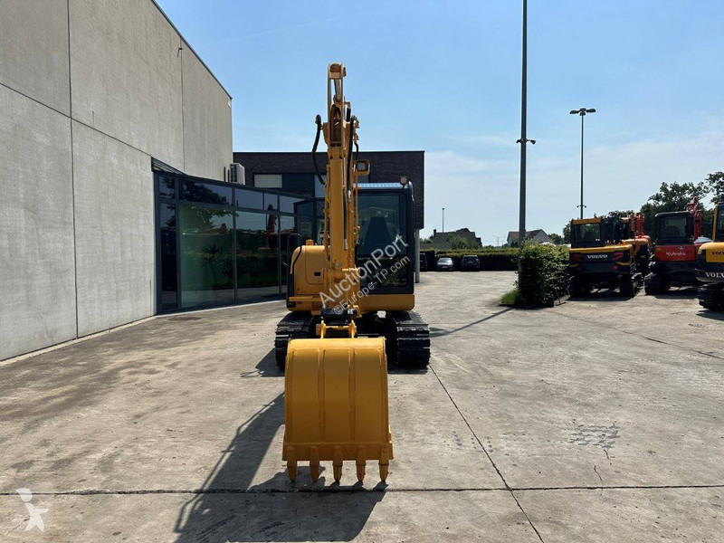 Екскаватор Komatsu 7