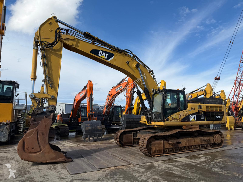 Екскаватор Caterpillar