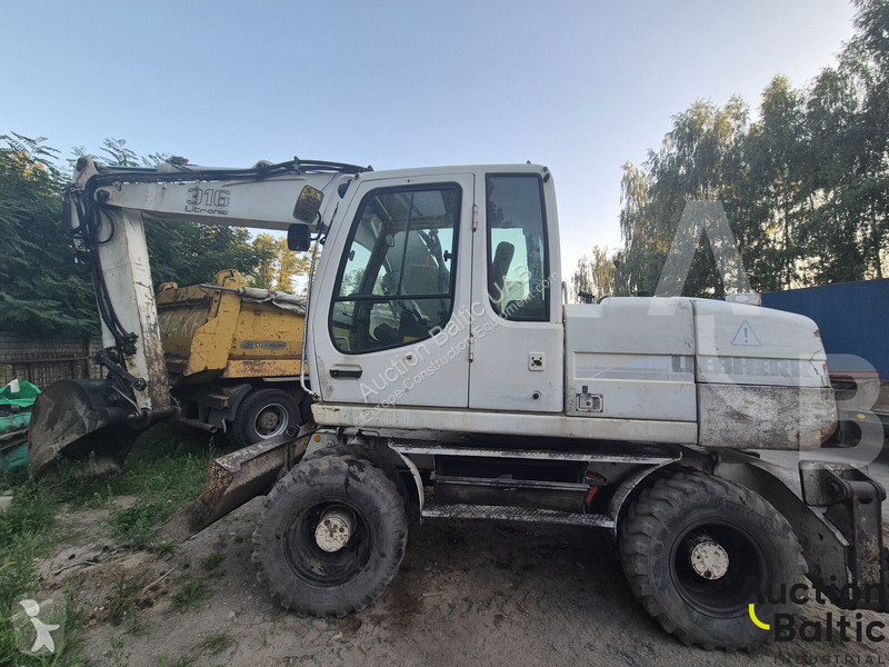Екскаватор Liebherr