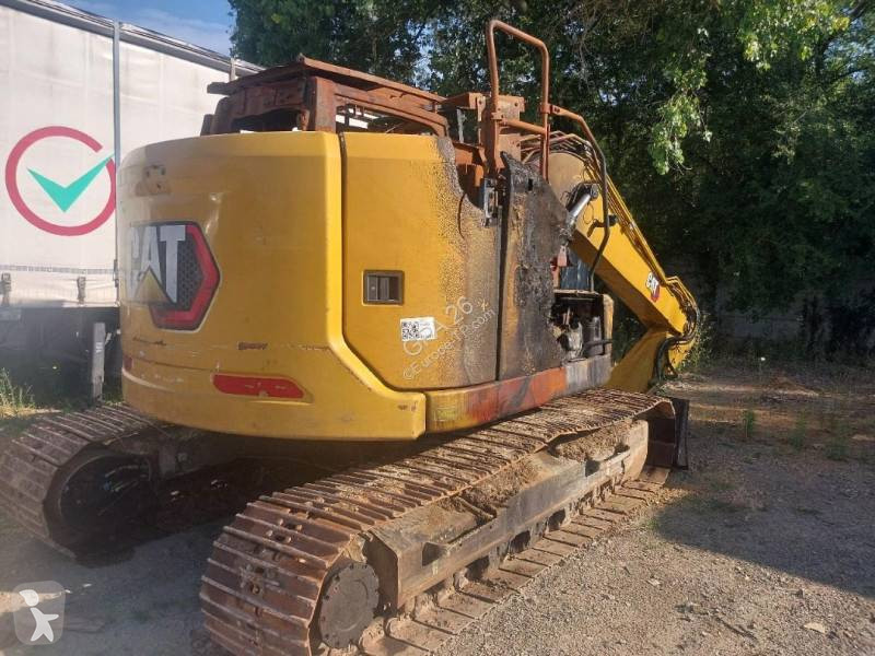 Екскаватор Caterpillar
