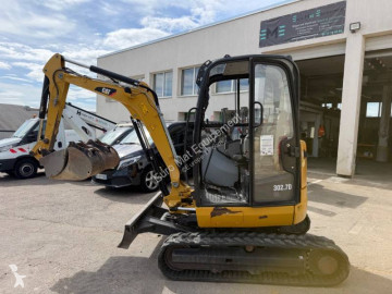 Міні-екскаватор Caterpillar