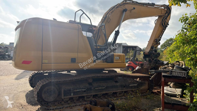 Багер Caterpillar 07D