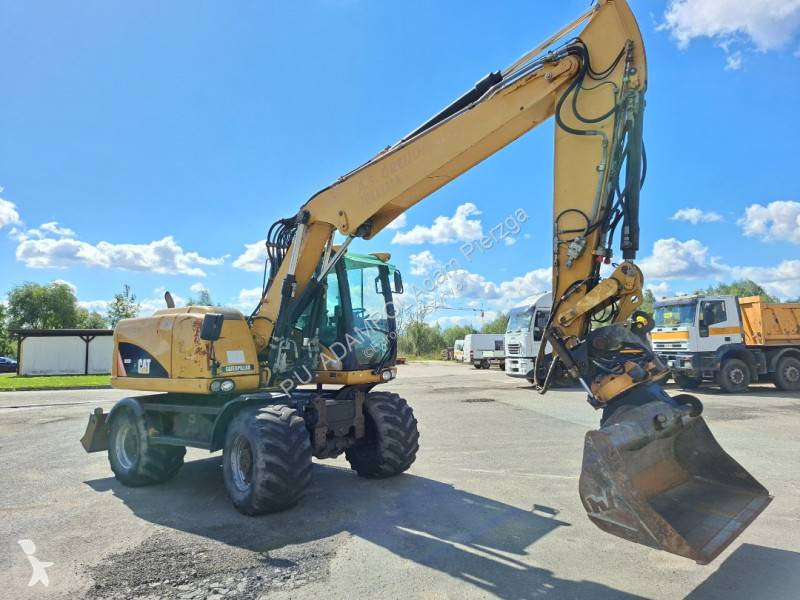جرافة Caterpillar M 313 D 315