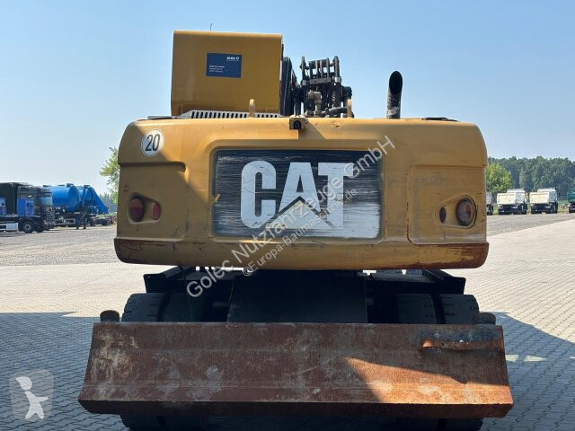 جرافة Caterpillar M313D Mobilbagger Hochfahr....