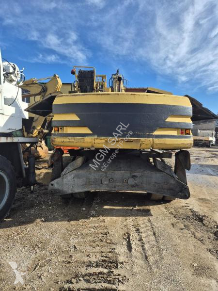 جرافة Caterpillar M Mono