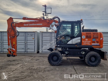 Pelle sur pneus Hitachi