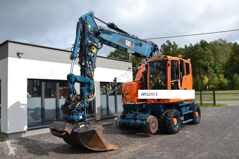Excavadora Caterpillar M