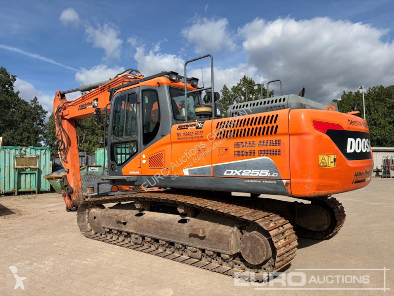 Багер Doosan 5