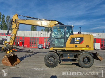 Pelle sur pneus Caterpillar