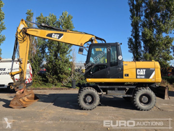 Pelle sur pneus Caterpillar